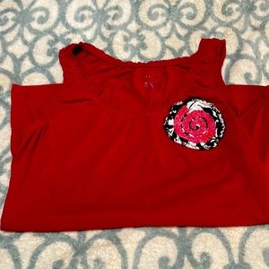 Red tank top with black and white rose.